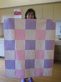 Lynette Thweatt with Quilt